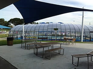Photo of a Double-Grande Laguna commercial swimming pool enclosure