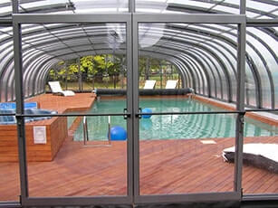 Photo of a Double-Grande Laguna commercial swimming pool enclosure