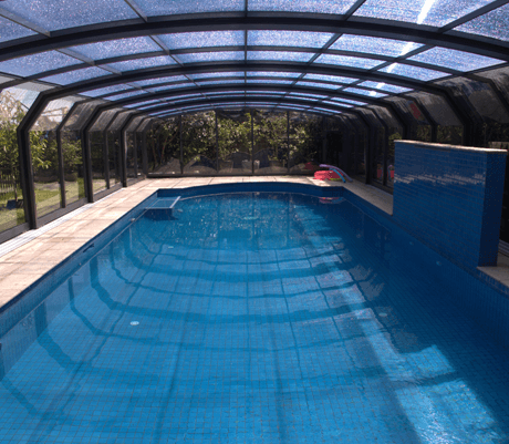 Photo of an swimming pool after a pool enclosure was installed