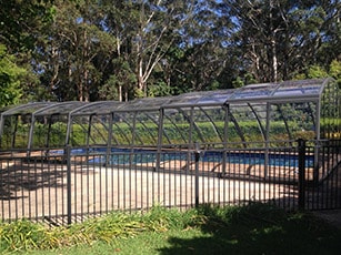 Photo of a Ravena High swimming pool enclosure
