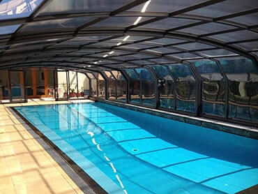 Photo of a high swimming pool enclosure