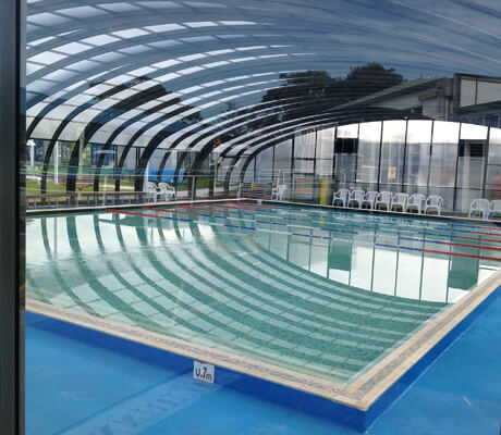 Photo of a swimming pool after a pool enclosure was installed