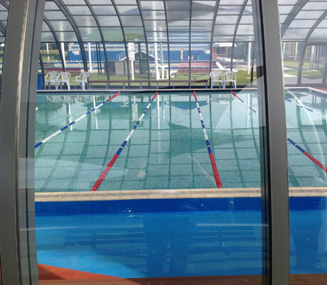 Photo of a Laguna Double-Grande swimming pool enclosure