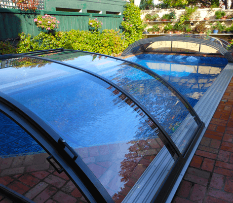 Photo of an Elegant swimming pool enclosure