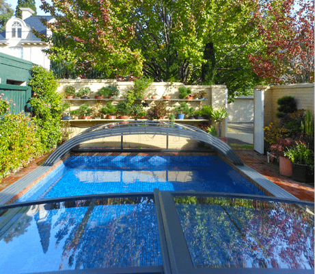 Photo of an Elegant swimming pool enclosure