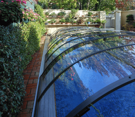Photo of a swimming pool after a pool enclosure was installed